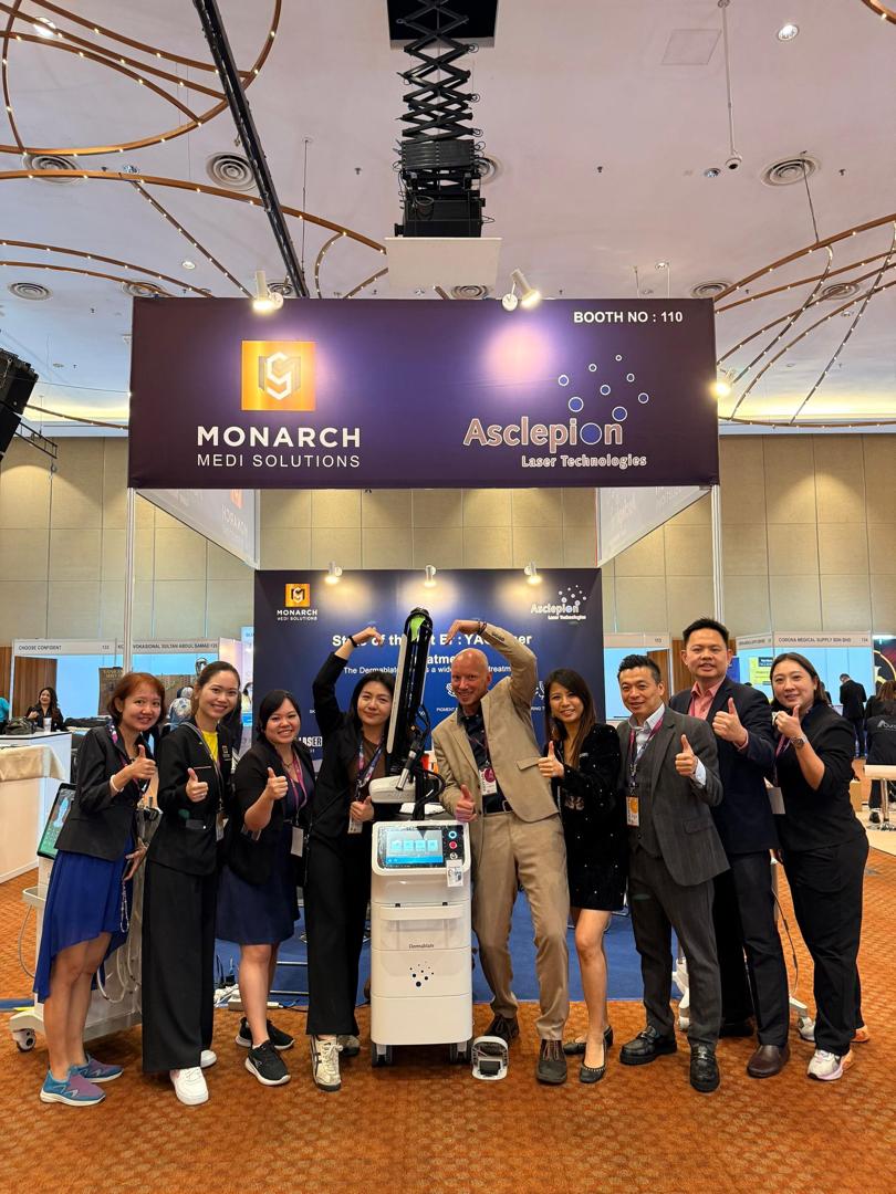 The Monarch Medi Solutions and Asclepion teams with the Dermablate Er:YAG laser at exhibition booth number 110